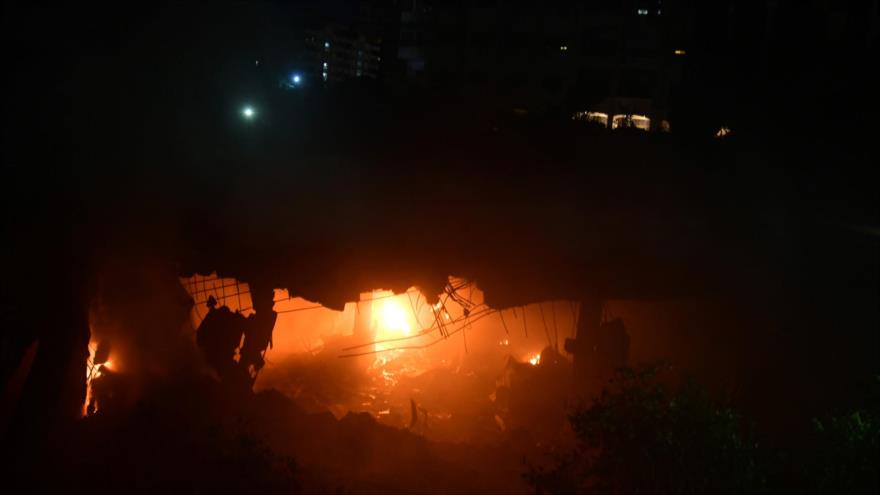 Incendio causado por un ataque israelí a Damasco, Siria, 14 de julio de 2024. (Foto: SANA)