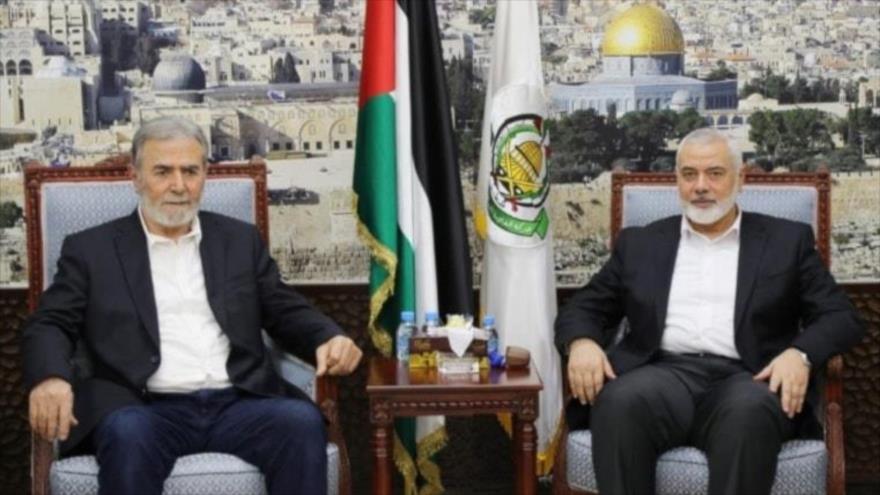 El jefe del Buró Político de HAMAS, Ismail Haniya (dcha.), y el secretario general de la Yihad Islámica, Ziad al-Najala.