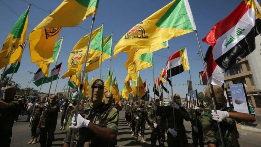 Combatientes del movimiento de Resistencia iraquí Kataib Hezbolá.