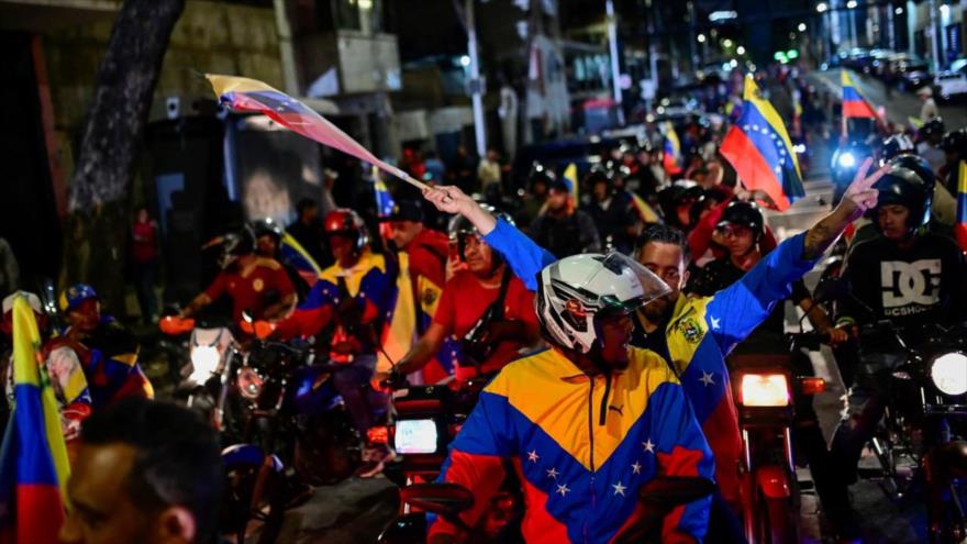 Simpatizantes del presidente de Venezuela, Nicolás Maduro, celebran su reelección, Caracas, la capital, 28 de julio de 2024. (Foto: Reuters)