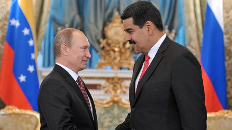 Los presidentes de Rusia, Vladimir Putin (izda.), y el de Venezuela, Nicolás Maduro.