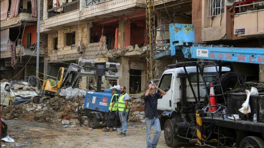 Un libanés reacciona ante la destrucción tras un ataque aéreo israelí en los suburbios del sur de Beirut, 25 de septiembre de 2024. (Foto: AP)
