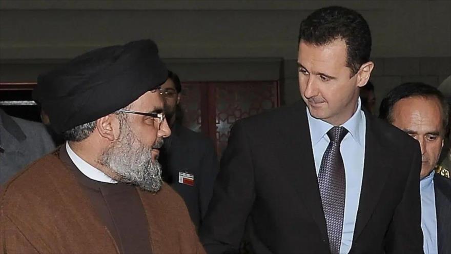 El presidente de Siria, Bashar al-Asad, junto al ahora difunto líder de Hezbolá, Seyed Hasan Nasralá.