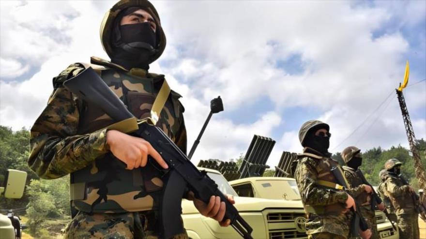 Los combatientes de Hezbolá participan en un ejercicio militar en la frontera con los territorios ocupados por Israel, 21 de mayo de 2023.
