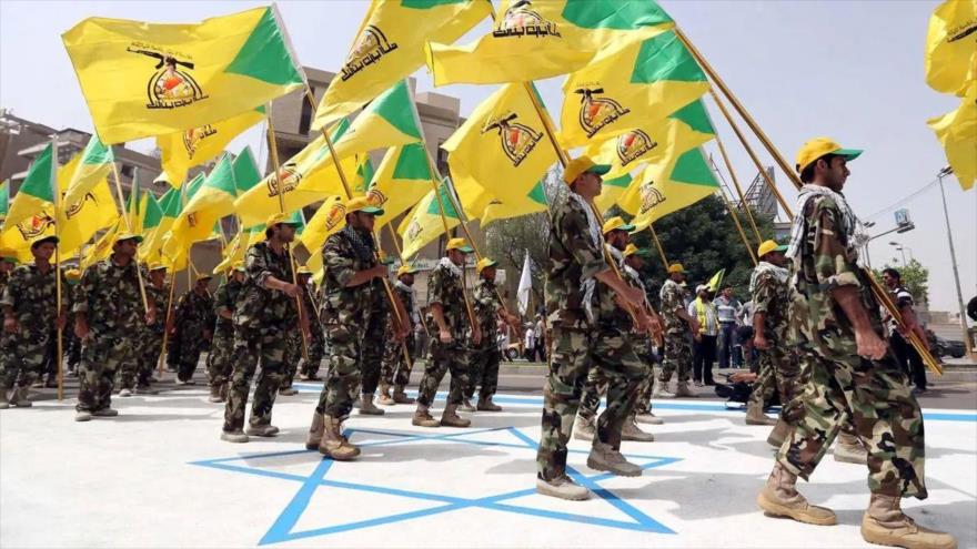 Los combatientes de la Resistencia Islámica de Irak durante un desfile. 