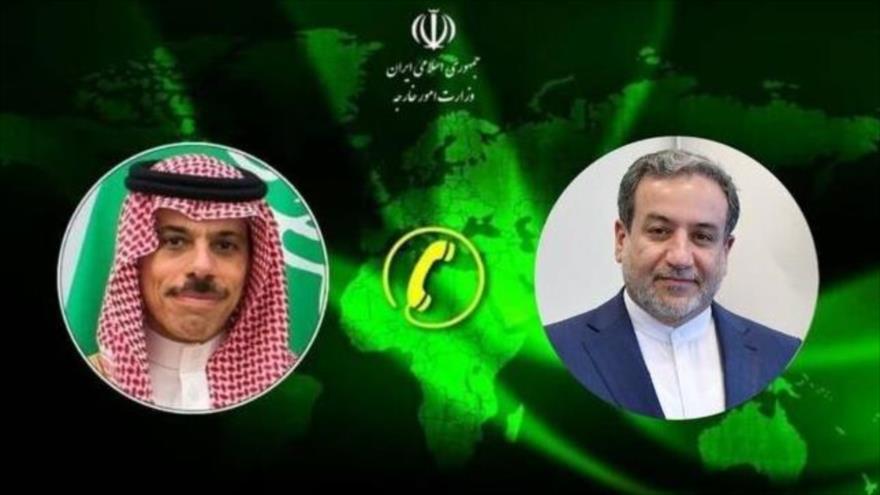 El ministro interino de Asuntos Exteriores de Irán, Ali Baqeri Kani, (dcha.) y el príncipe heredero de Arabia Saudí, Muhamad bin Salman.