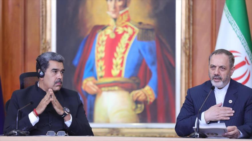 El ministro de Defensa de Irán, el general de brigada Aziz Nasirzade (dcha.), y el presidente venezolano, Nicolás Maduro, durante una reunión, Caracas, 21 de noviembre de 2024.