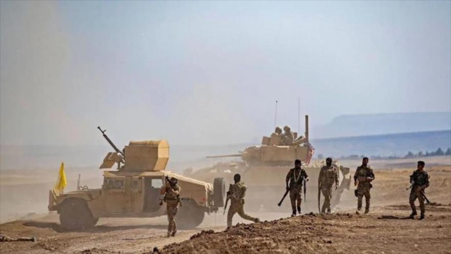 Las Fuerzas Democráticas Sirias (FDS), aliadas de Estados Unidos, durante una maniobra militar en Siria.