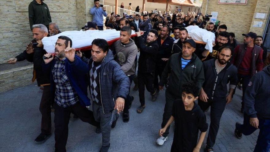 Los dolientes reaccionan durante el funeral de los palestinos muertos en un ataque israelí, en la ciudad de Gaza, 11 de marzo de 2025. (Foto: Reuters)