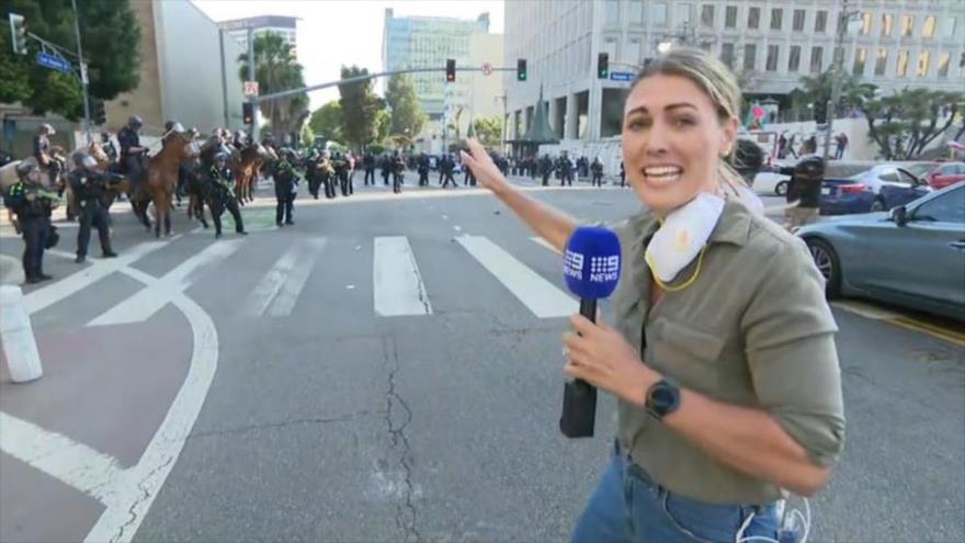 Policía de EEUU hiere con bala de goma a periodista australiana en vivo