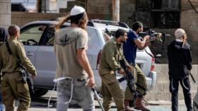 Olmert: Colonos cometen crímenes de guerra diarios en Cisjordania
