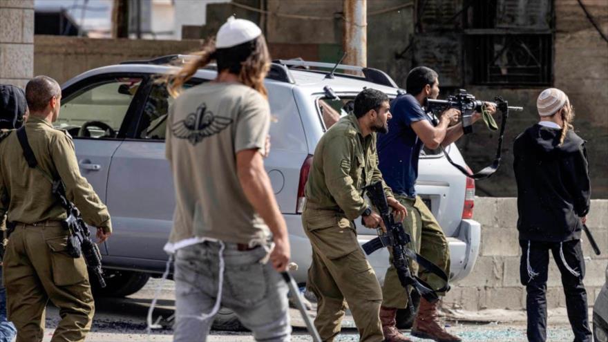 Olmert: Colonos cometen crímenes de guerra diarios en Cisjordania | HISPANTV