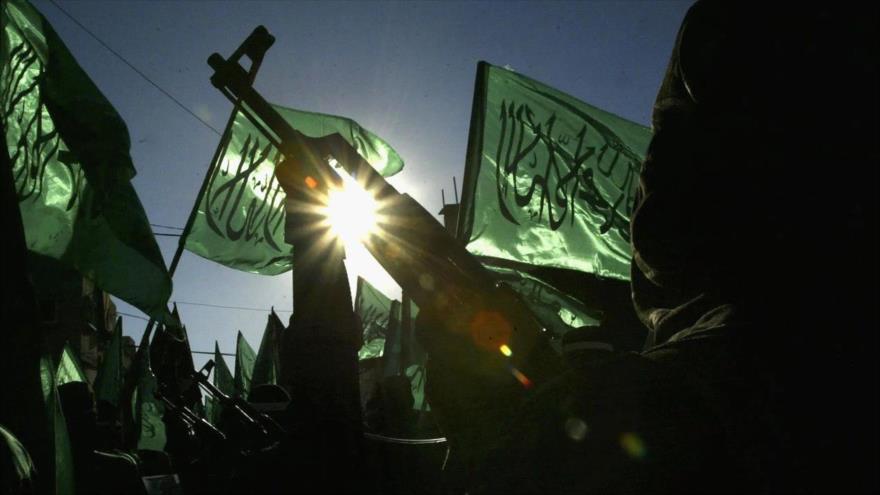 Combatientes de HAMAS marchan durante una manifestación en el campo de refugiados de Rafah, 2003.