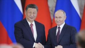 China desoye advertencias de Trump y defiende su cooperación con Rusia