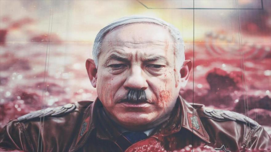 Tras el genocidio en la Franja de Gaza, comparan al primer ministro israelí, Benjamín Netanyahu, con Hitler en un cartel publicitario en Teherán, la capital de Irán.