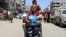 FOTOS: Palestinos huyen ante el feroz bombardeo israelí en Gaza