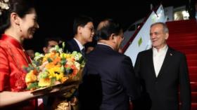En fotos: presidente iraní llega a China para participar en OCS