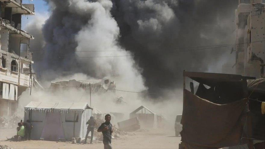 Una columna de humo se eleva tras un ataque con misiles de Israel en la Franja de Gaza, septiembre de 2025.
