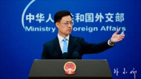 China reta a Estados Unidos y defiende su comercio con Irán