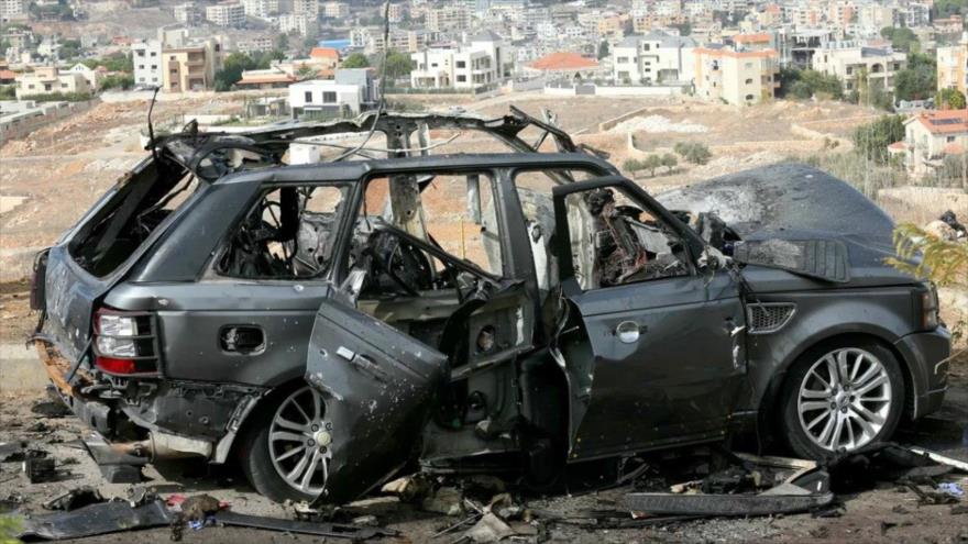 Restos de un vehículo tras un ataque aéreo israelí en Kfar Reman, sur del Líbano. (Foto: AFP)