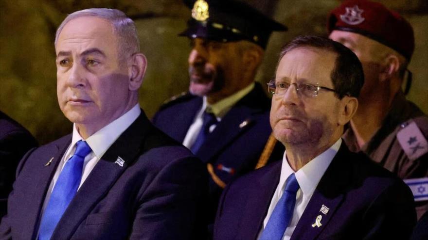 El presidente israelí, Isaac Herzog (dcha.), y el primer ministro del régimen, Benjamín Netanyahu.