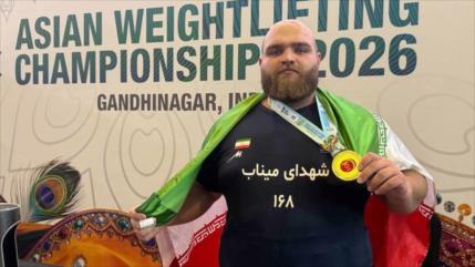 Halterófilo iraní gana oro asiático y rompe récord mundial en superpesado