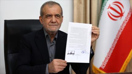 Fotos: Presidente iraní firma memorando de entendimiento con EEUU