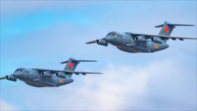 China adapta sus aviones de transporte para funciones de combate