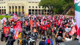 Repartidores se movilizan por Lula y reclaman derechos laborales antes de la 2.ª vuelta